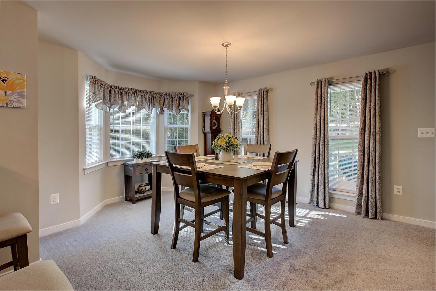 6144 Courthouse Road Louisa, VA 23093 - Photo 5 of 23 a view of a dining room with furniture and window