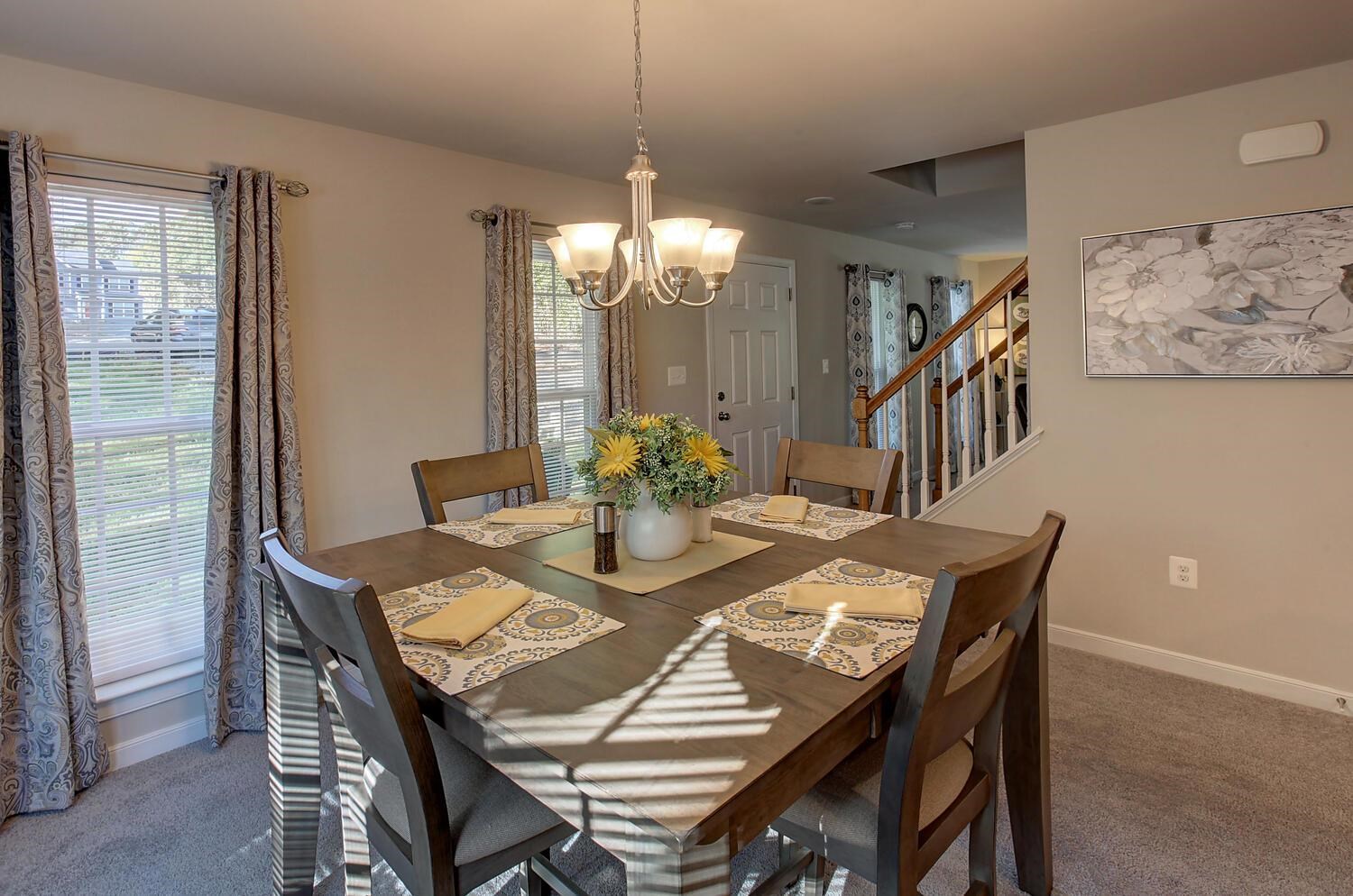 6144 Courthouse Road Louisa, VA 23093 - Photo 8 of 23 a view of a dining room with furniture window and wooden floor