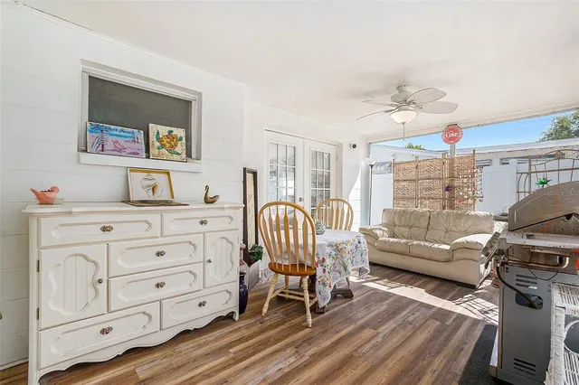 a bedroom with furniture and a window