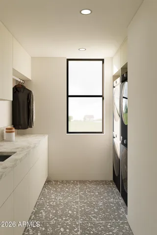 a bathroom with a bathtub and a sink