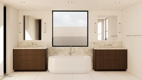 a bathroom with a bathtub sink and mirror