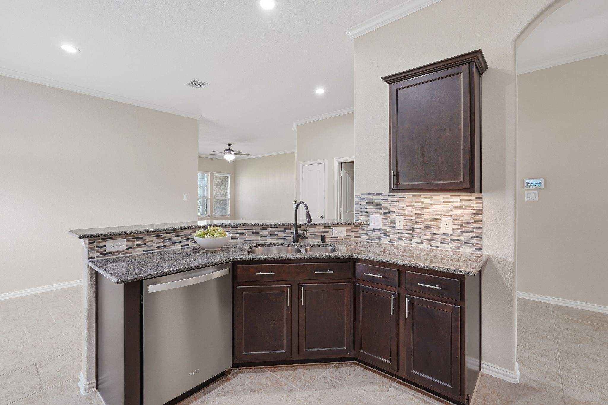 18227 Tacoma Ridge Drive Tomball, TX 77377 - Photo 11 of 45 Large breakfast bar creates the perfect gathering spot for family and guests.