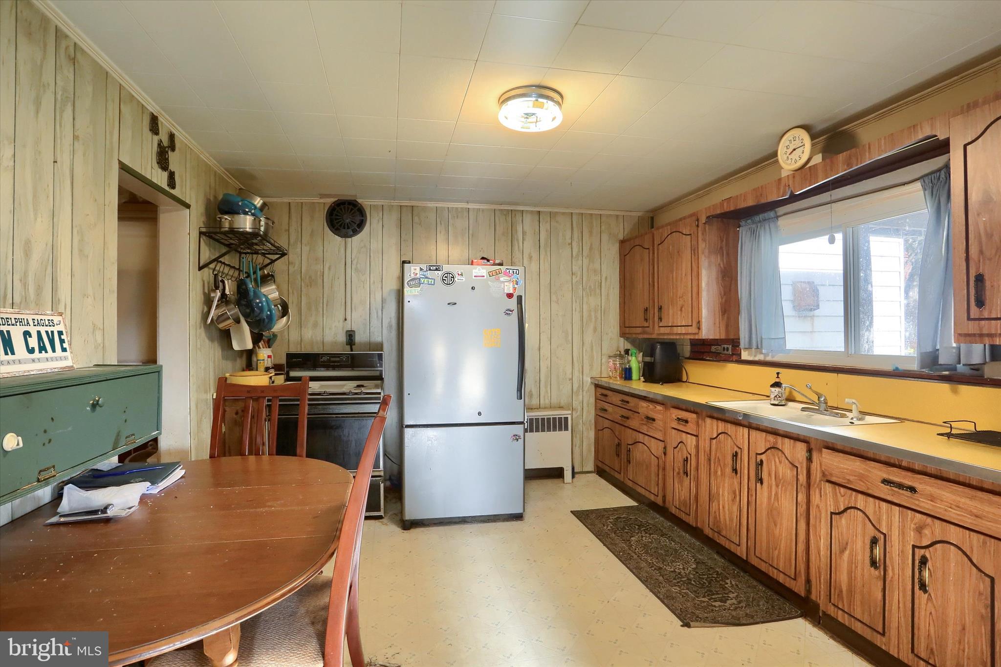 1110 Main Street Harrisburg, PA 17113 - Photo 12 of 37 a kitchen with stainless steel appliances granite countertop a refrigerator a stove and a sink with cabinets
