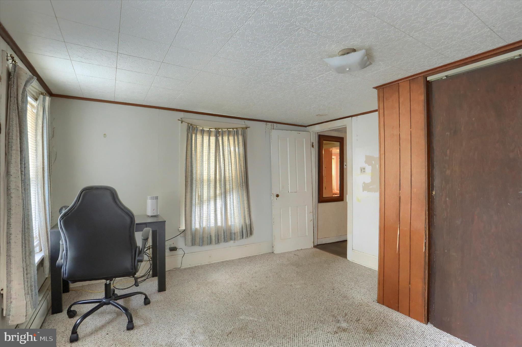 1110 Main Street Harrisburg, PA 17113 - Photo 21 of 37 a view of a workspace with furniture and a window