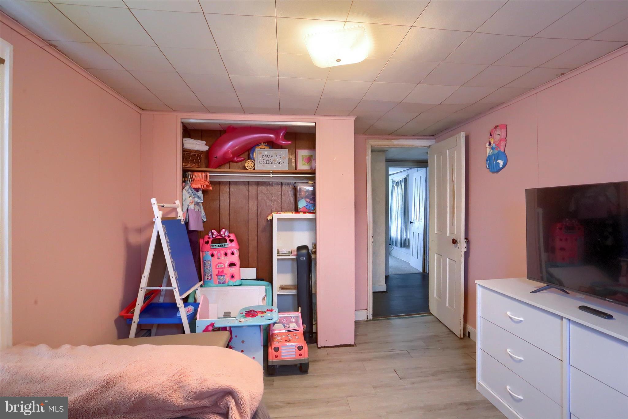 1110 Main Street Harrisburg, PA 17113 - Photo 23 of 37 a bedroom with furniture and flat screen tv