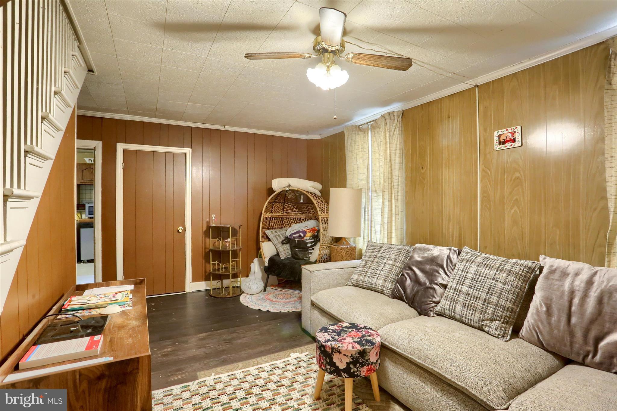 1110 Main Street Harrisburg, PA 17113 - Photo 6 of 37 a living room with furniture and a chandelier