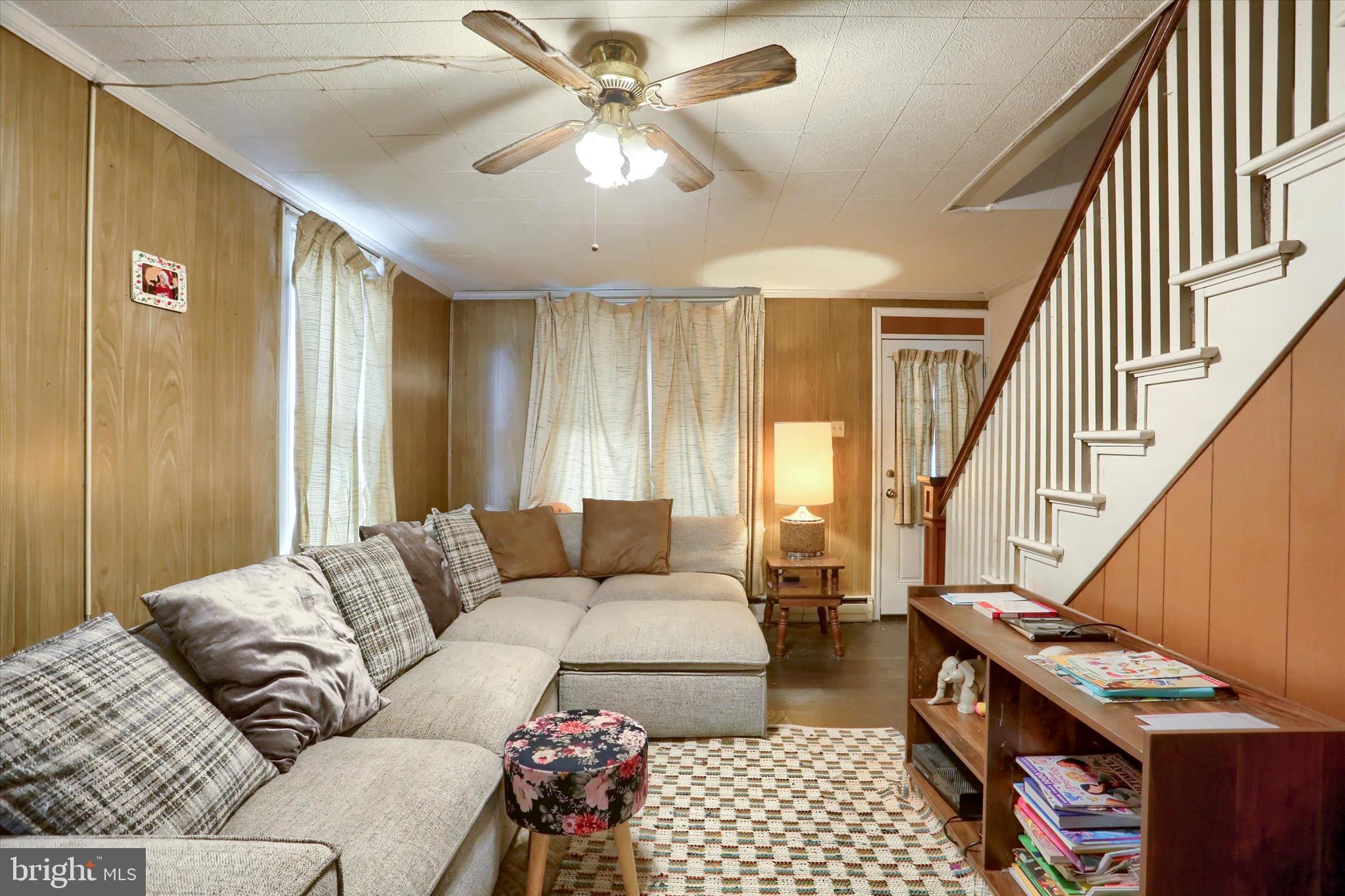 1110 Main Street Harrisburg, PA 17113 - Photo 8 of 37 a living room with furniture and a window