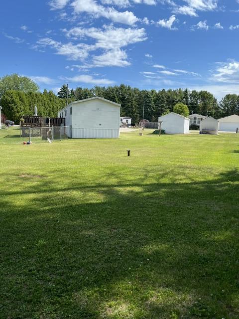 7136 Tannery Road, Unit 19 Two Rivers, WI 54241 - Photo 6 of 21 Back to front