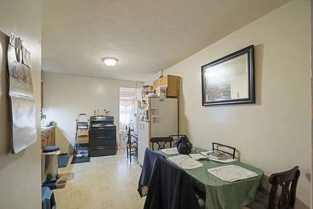 a bathroom with double vanity sink and mirror
