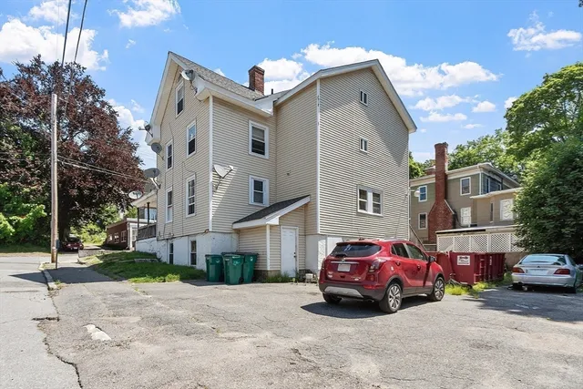 a front view of a house with garage