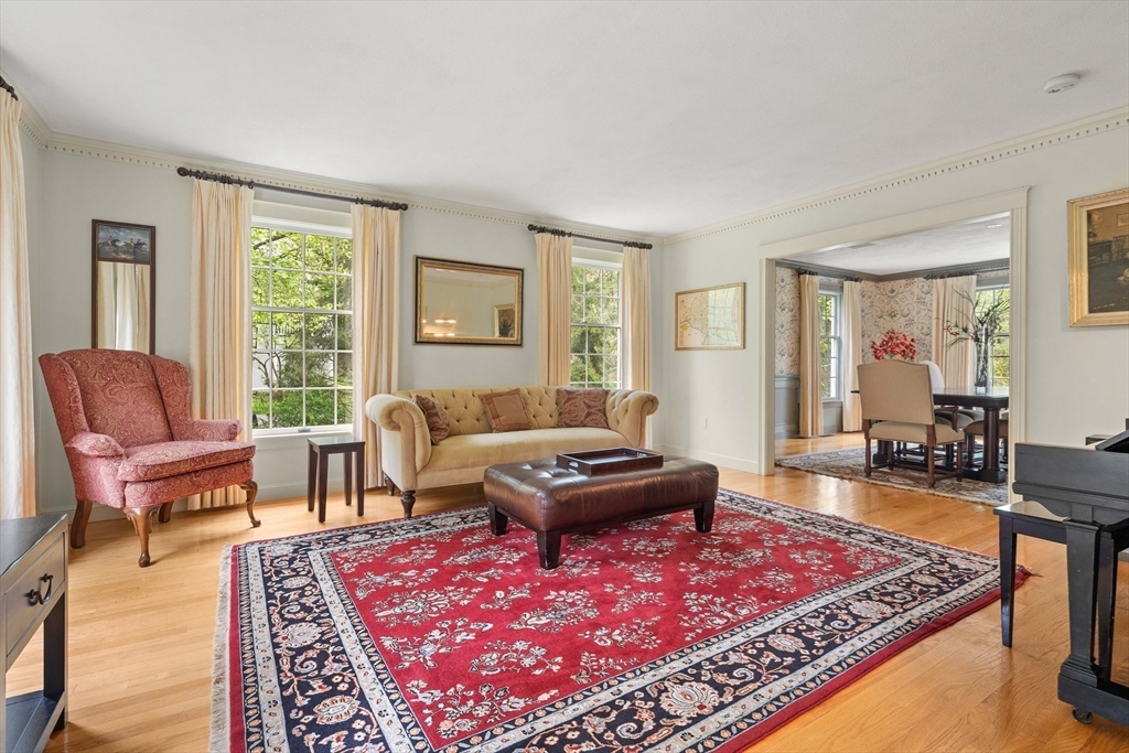37 Old Planters Road Beverly, MA 01915 - Photo 6 of 42 a living room with furniture and a rug