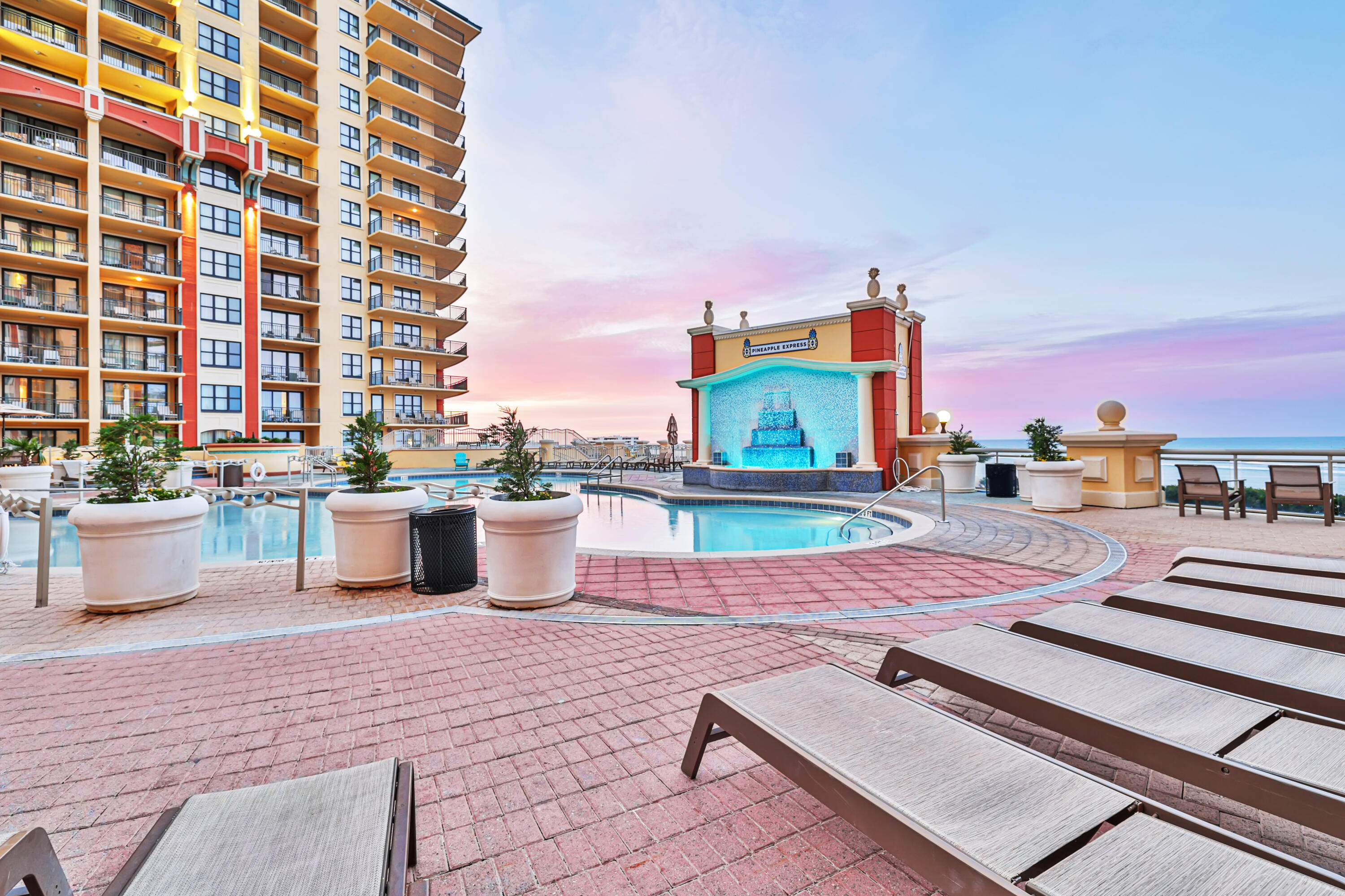 10 Harbor Boulevard, Unit E802B Destin, FL 32541 - Photo 21 of 25 a swimming pool with outdoor seating and city view