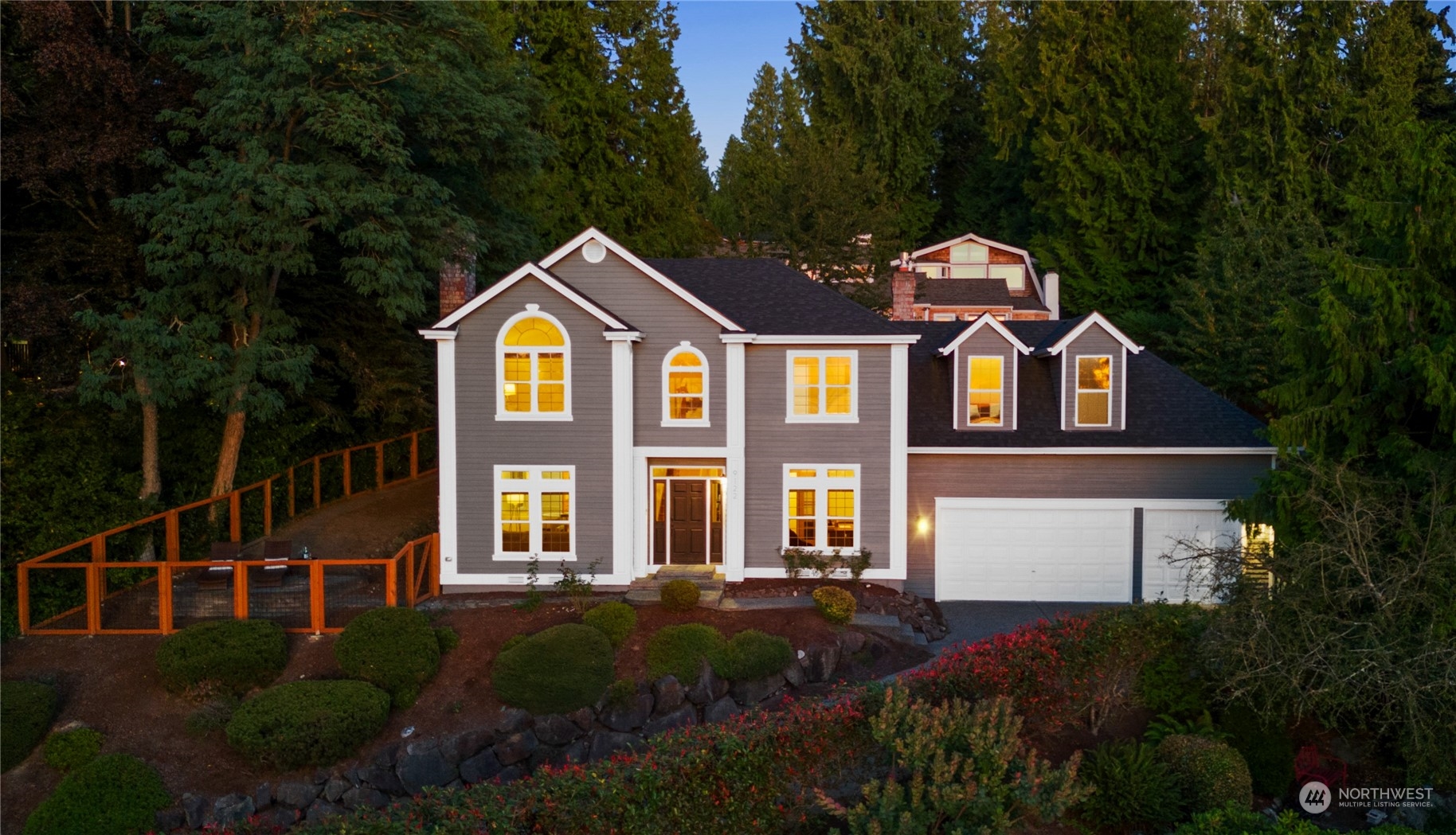 9122 Olympic View Drive Edmonds, WA 98026 - Photo 1 of 40 a front view of a house with a garden
