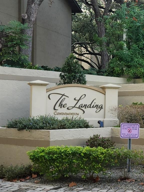 623 Dory Lane, Unit 306 Altamonte Springs, FL 32714 - Photo 2 of 21 a view of sign board and yard