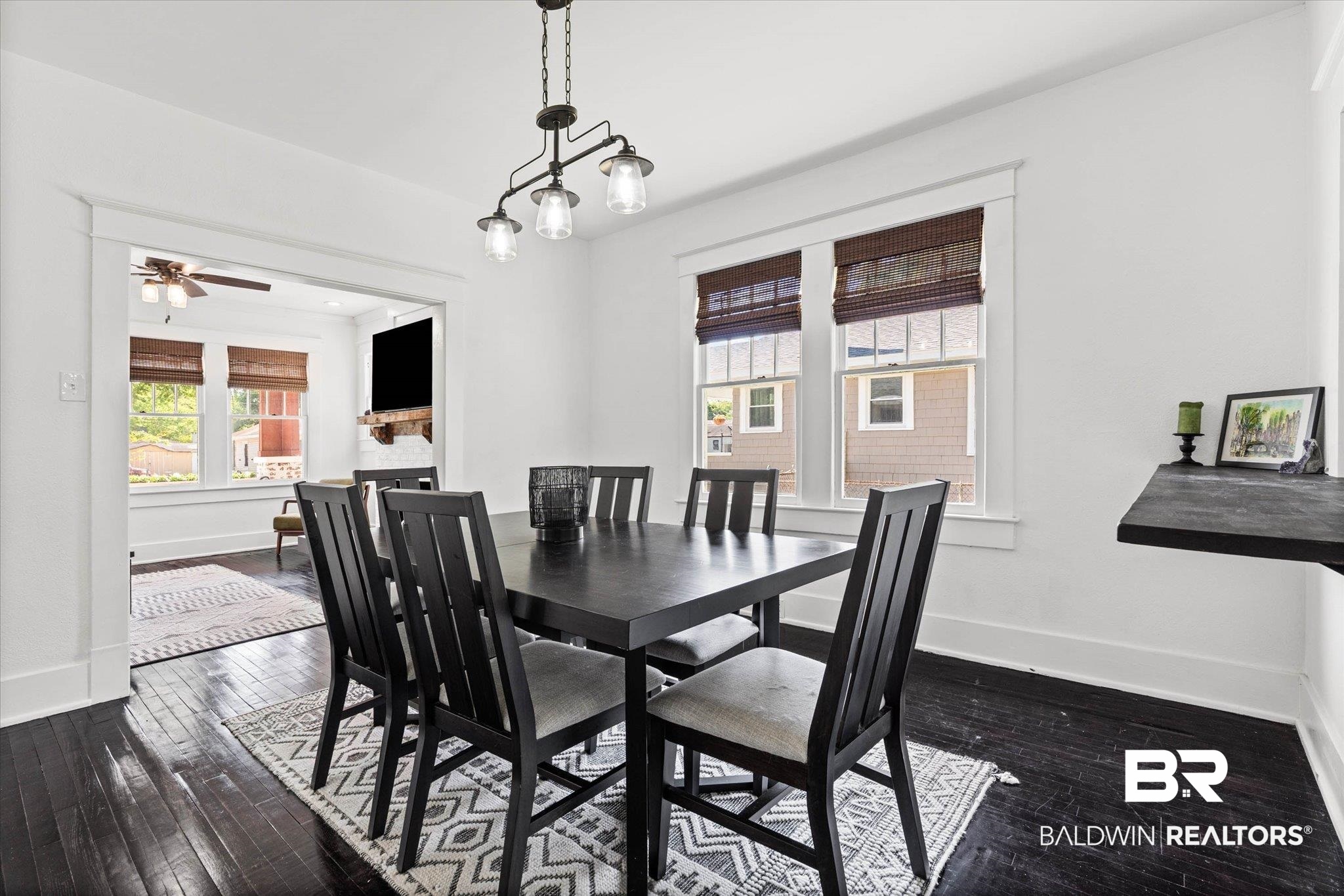 121 North Carlen Street Mobile, AL 36607 - Photo 6 of 21 Dining area featuring dark wood-style floors and ceiling fan