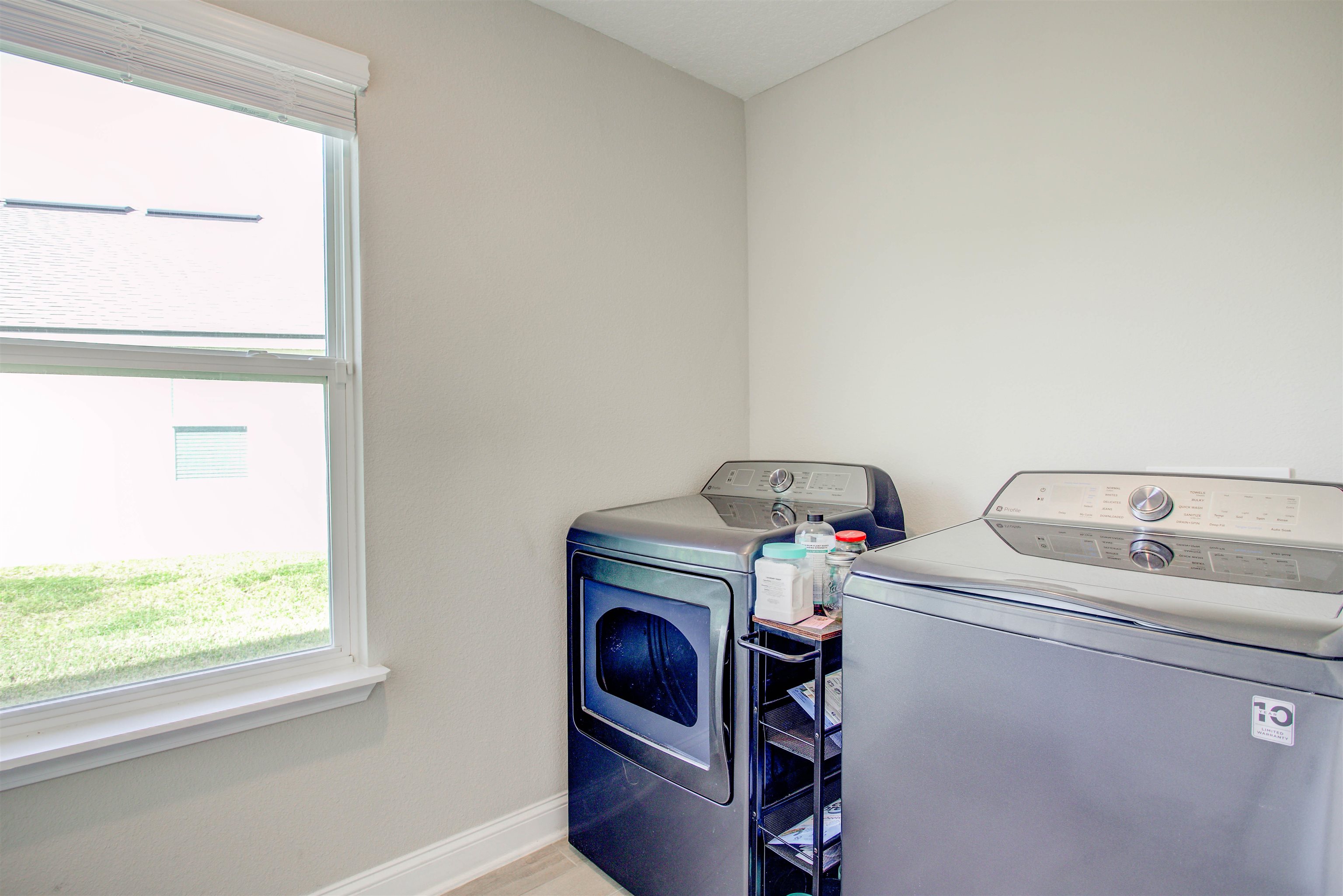 130 Huesca Court St. Augustine, FL 32084 - Photo 19 of 63 a utility room with dryer and washer