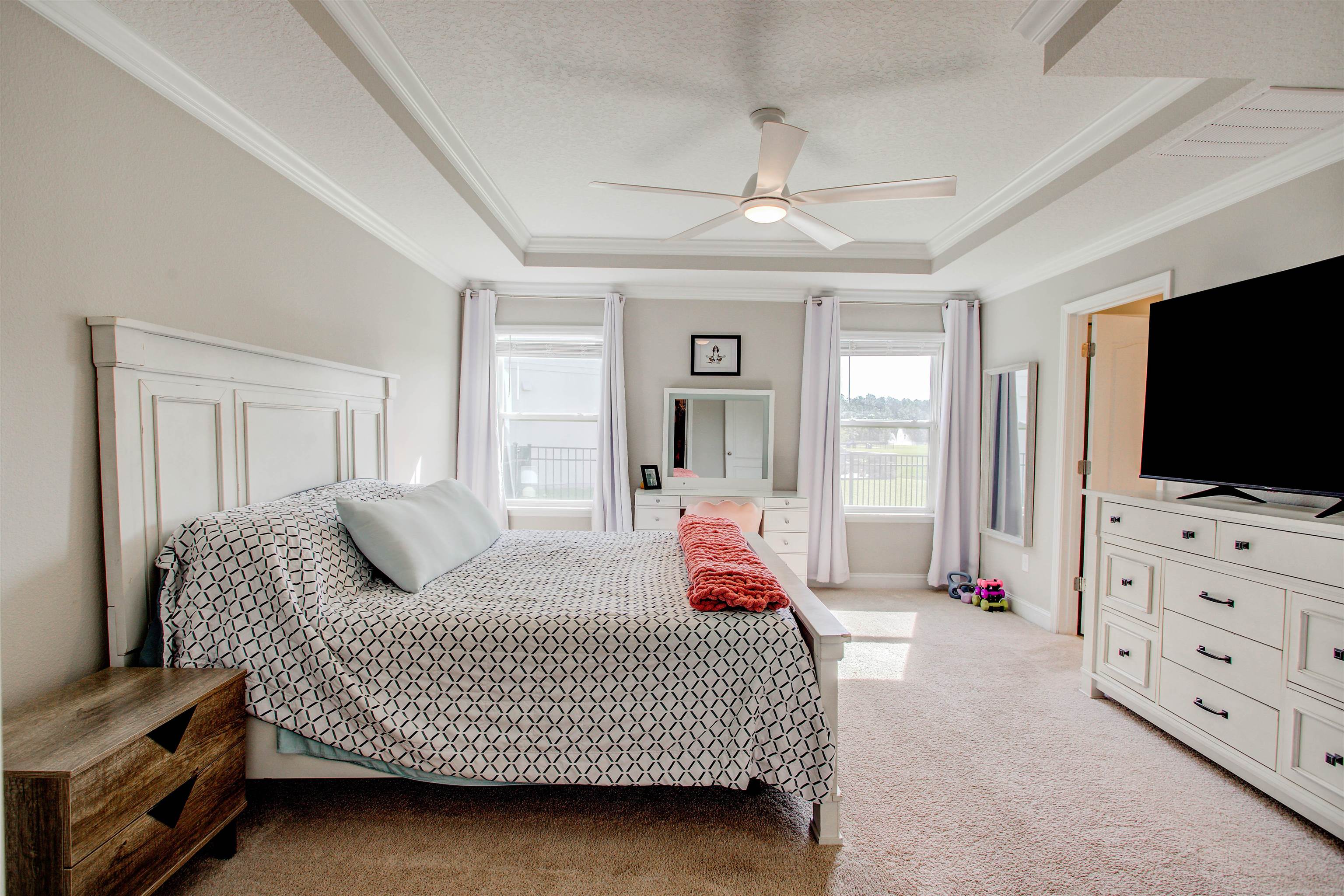 130 Huesca Court St. Augustine, FL 32084 - Photo 21 of 63 a bedroom with a bed and flat screen tv