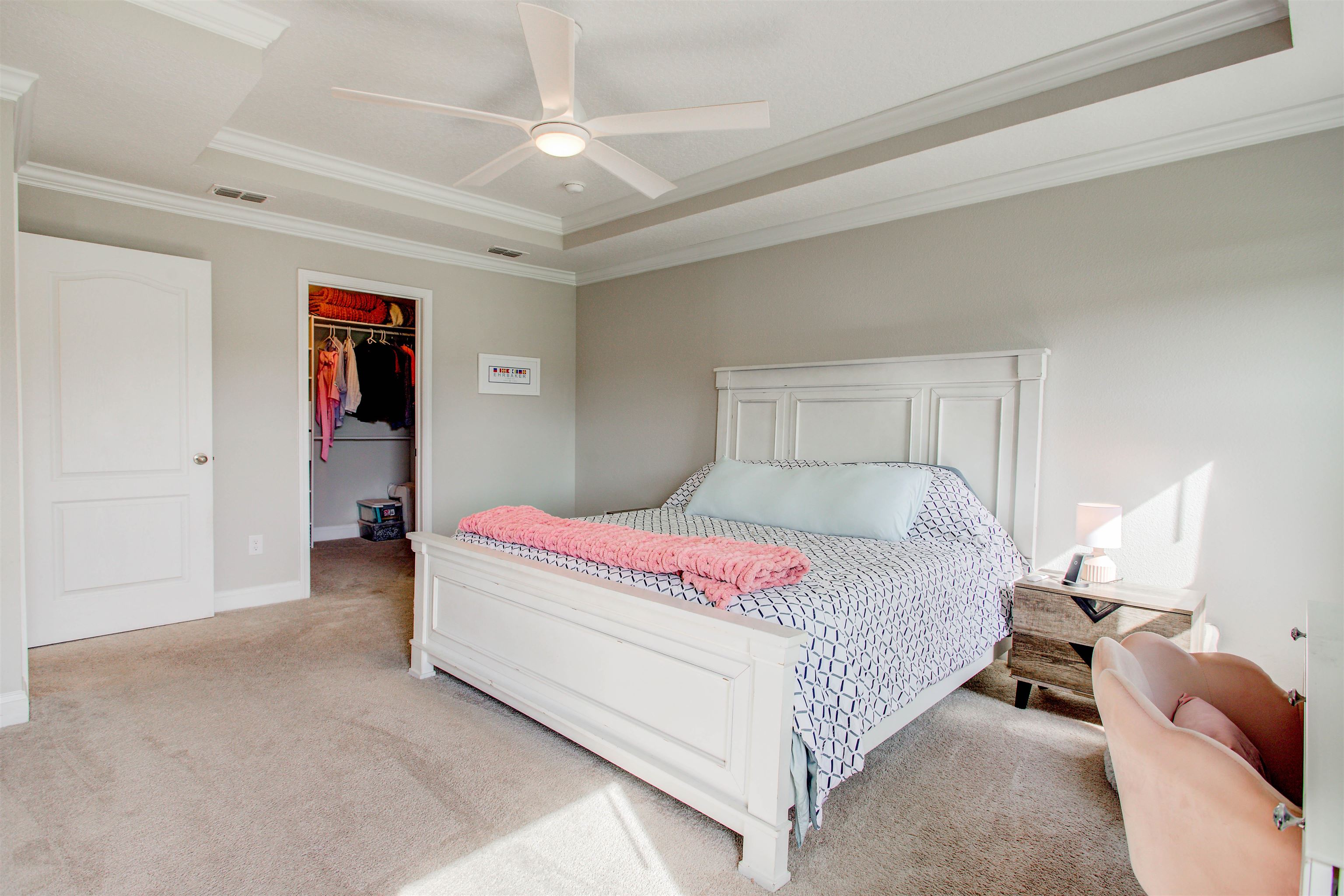 130 Huesca Court St. Augustine, FL 32084 - Photo 22 of 63 a bedroom with a bed and a chandelier