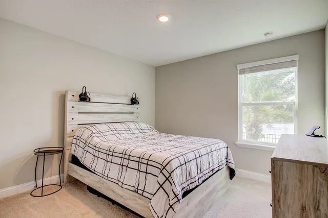 a view of a balcony with lake view and a potted plant