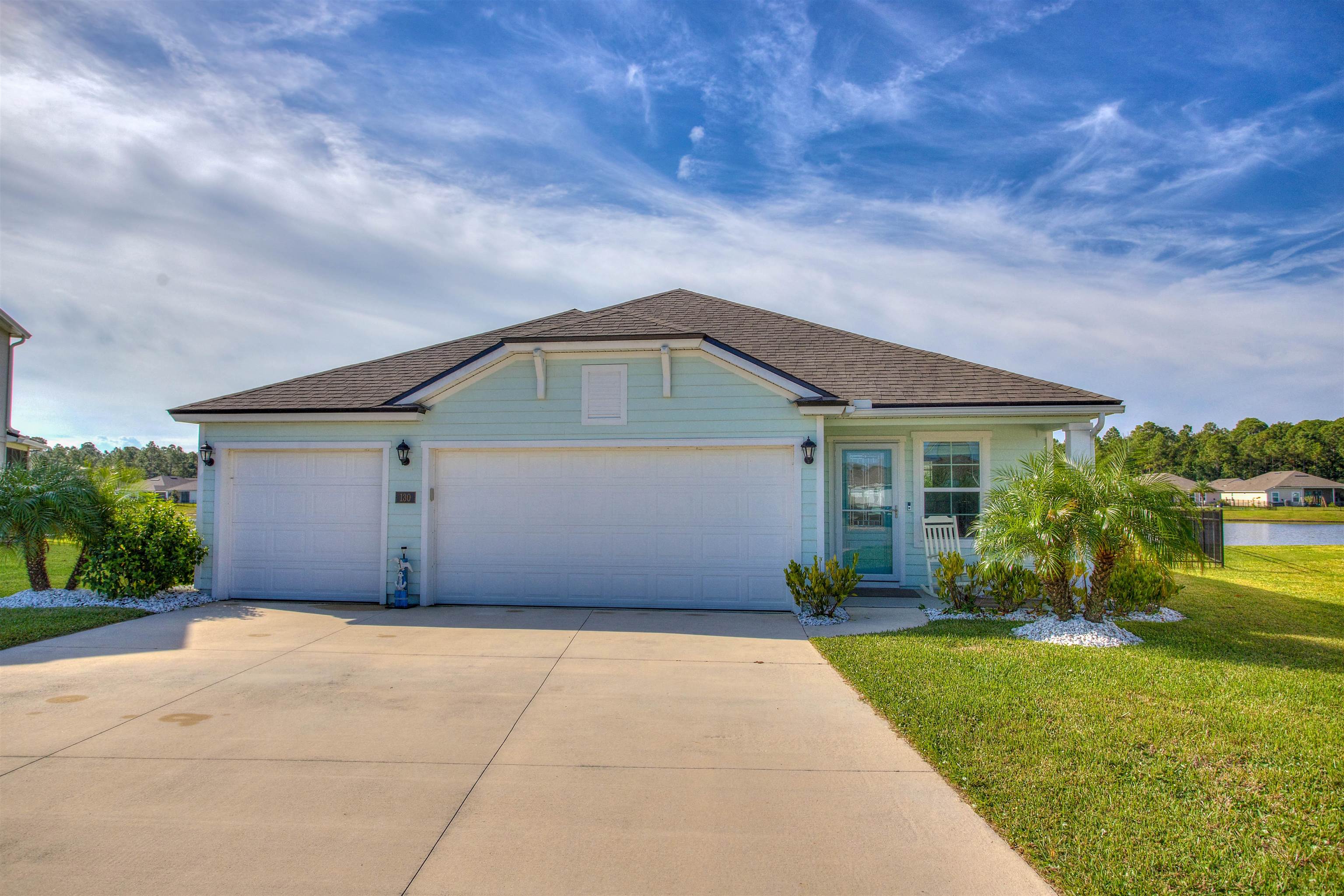 130 Huesca Court St. Augustine, FL 32084 - Photo 3 of 63 a front view of house with yard and green space