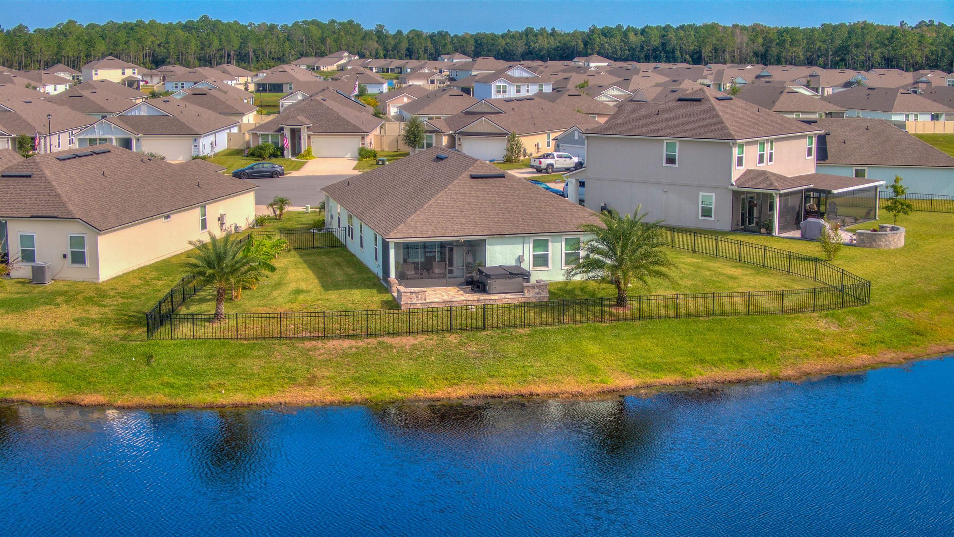 130 Huesca Court St. Augustine, FL 32084 - Photo 38 of 63 an aerial view of residential houses with outdoor space and swimming pool