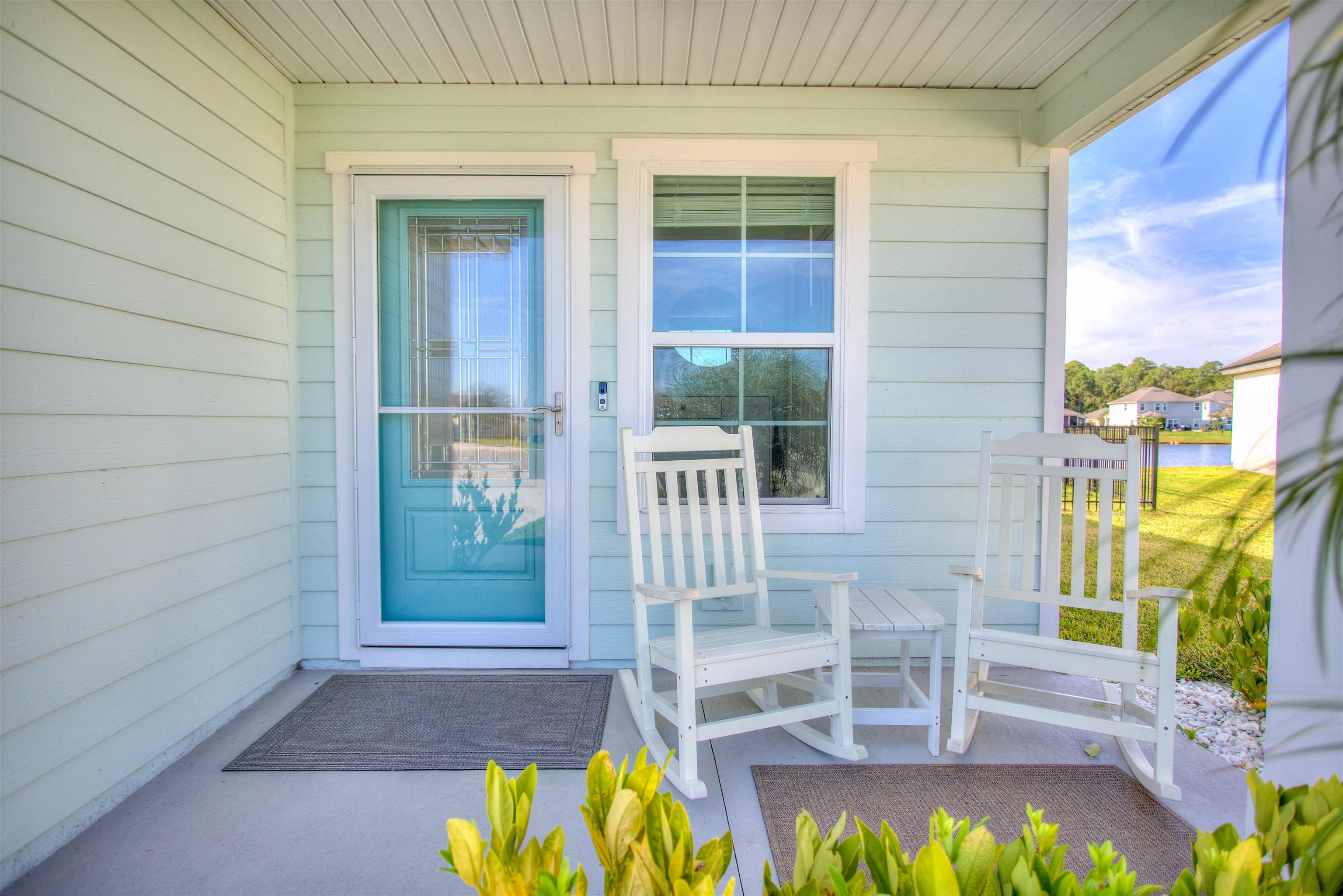 130 Huesca Court St. Augustine, FL 32084 - Photo 4 of 63 a view of front door of house with outdoor seating