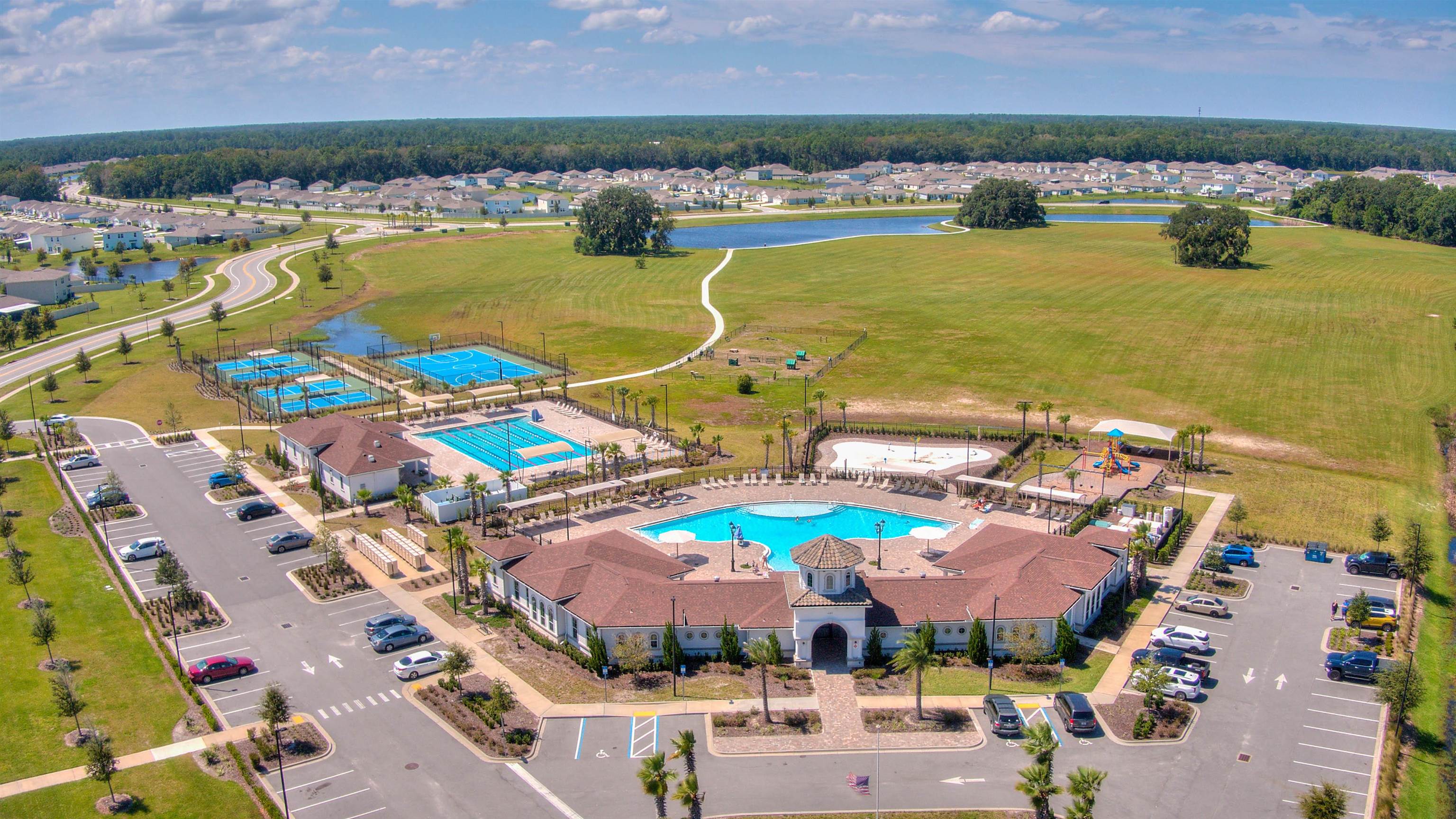 130 Huesca Court St. Augustine, FL 32084 - Photo 54 of 63 Aerial view of a pool area and a large body of water