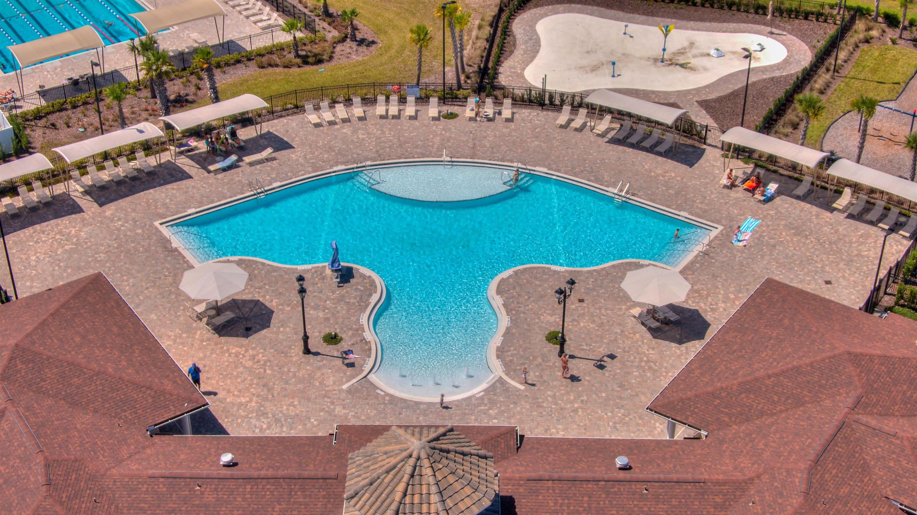 130 Huesca Court St. Augustine, FL 32084 - Photo 55 of 63 an aerial view of a house swimming pool patio and outdoor seating