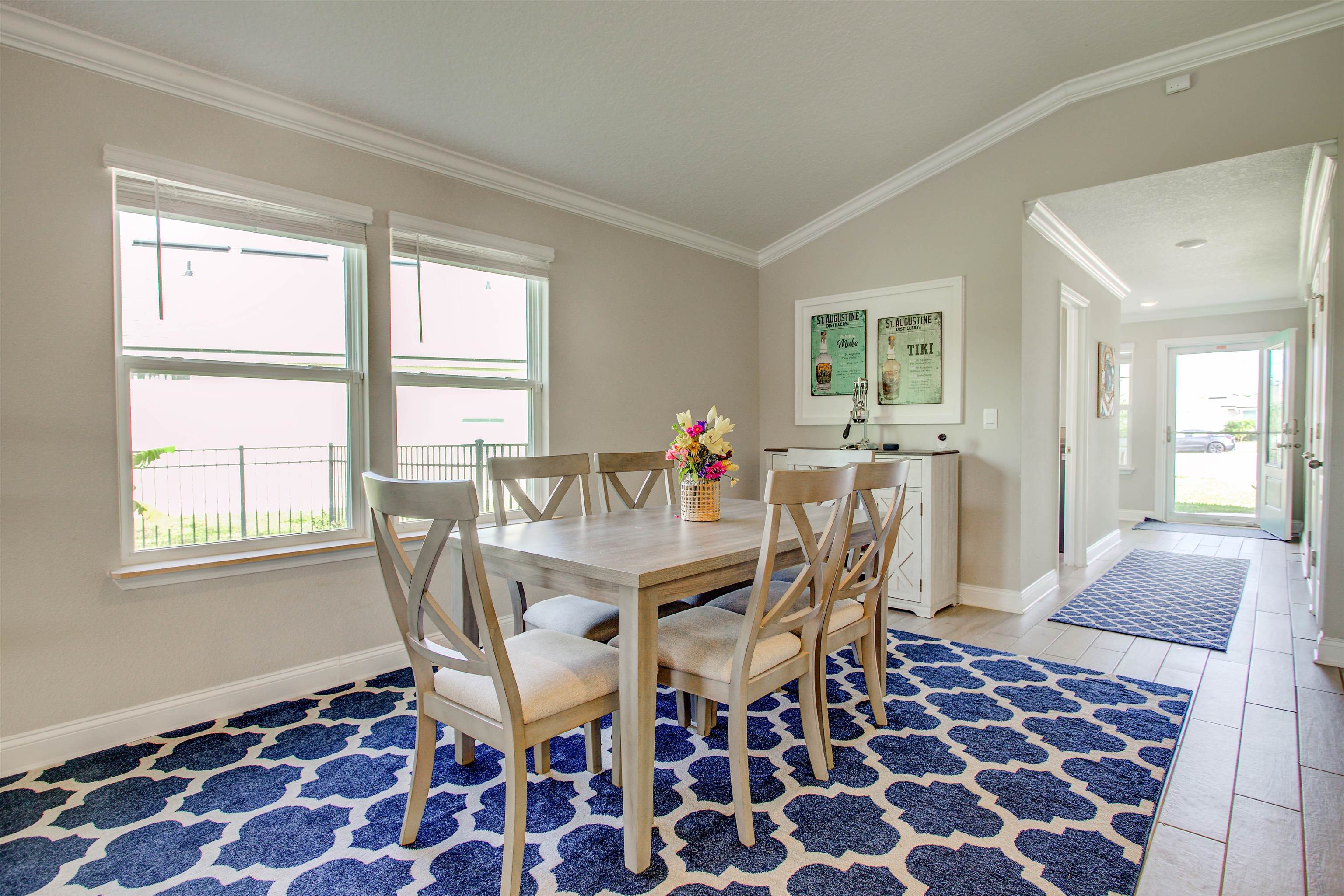 130 Huesca Court St. Augustine, FL 32084 - Photo 8 of 63 a view of a dining room with furniture and wooden floor