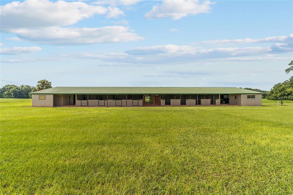 17176 North US Highway 441 Reddick, FL 32686 - Photo 11 of 42 a front view of a house with a garden