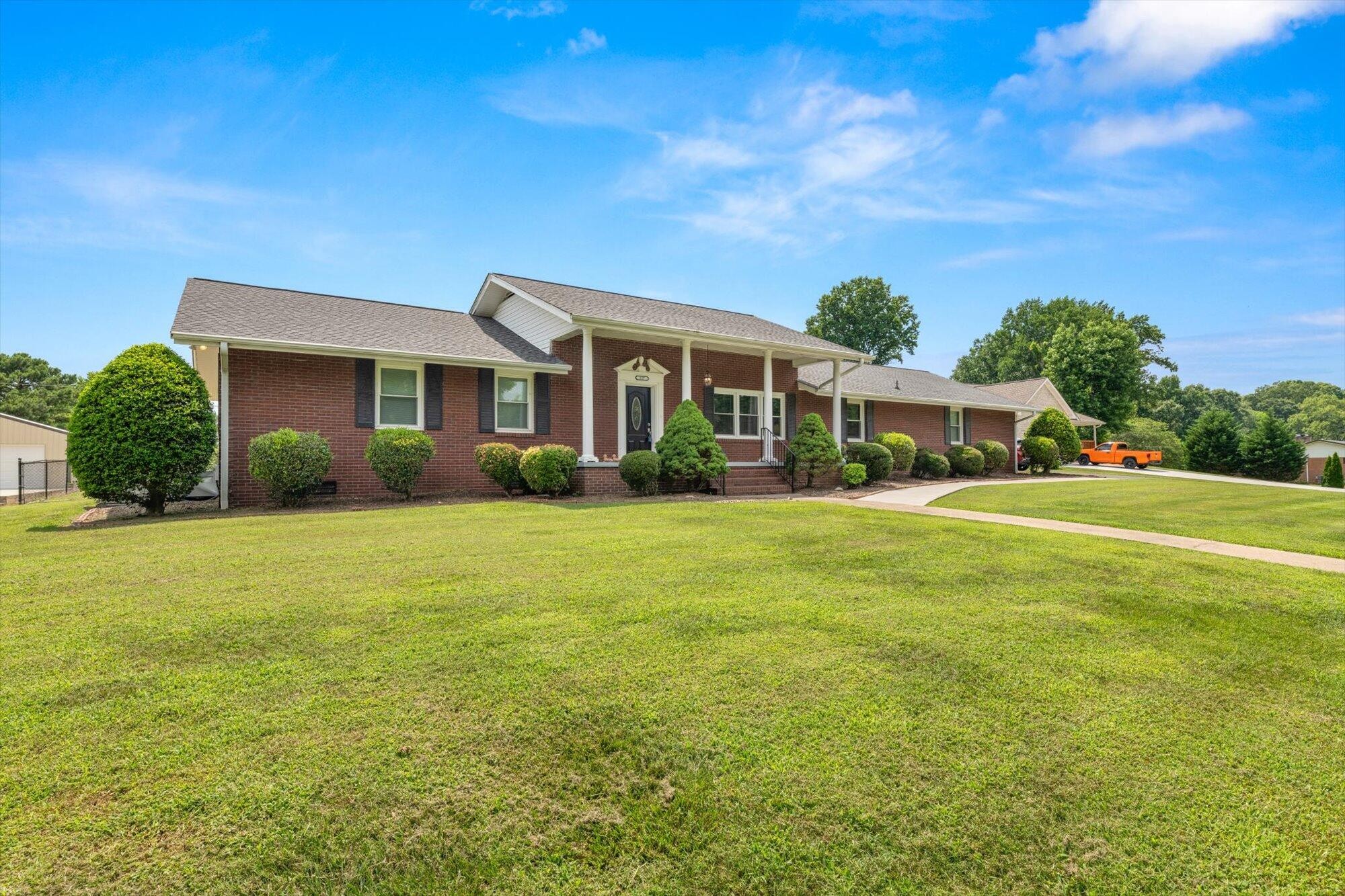 137 County Road 146 Riceville, TN 37370 - Photo 1 of 58 a front view of house with yard and green space