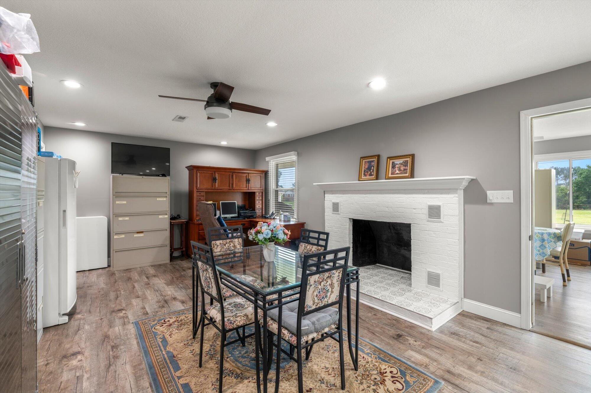 137 County Road 146 Riceville, TN 37370 - Photo 16 of 58 a view of a livingroom with furniture and a fireplace