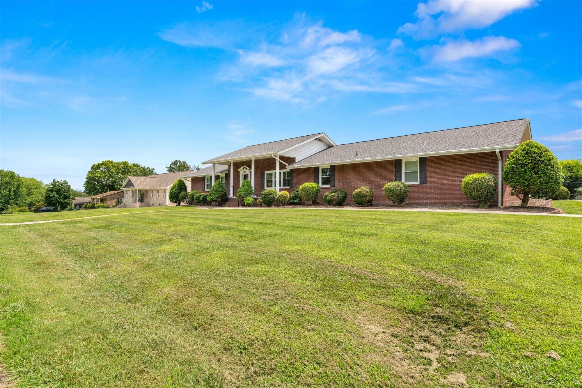 137 County Road 146 Riceville, TN 37370 - Photo 2 of 58 a front view of house with yard