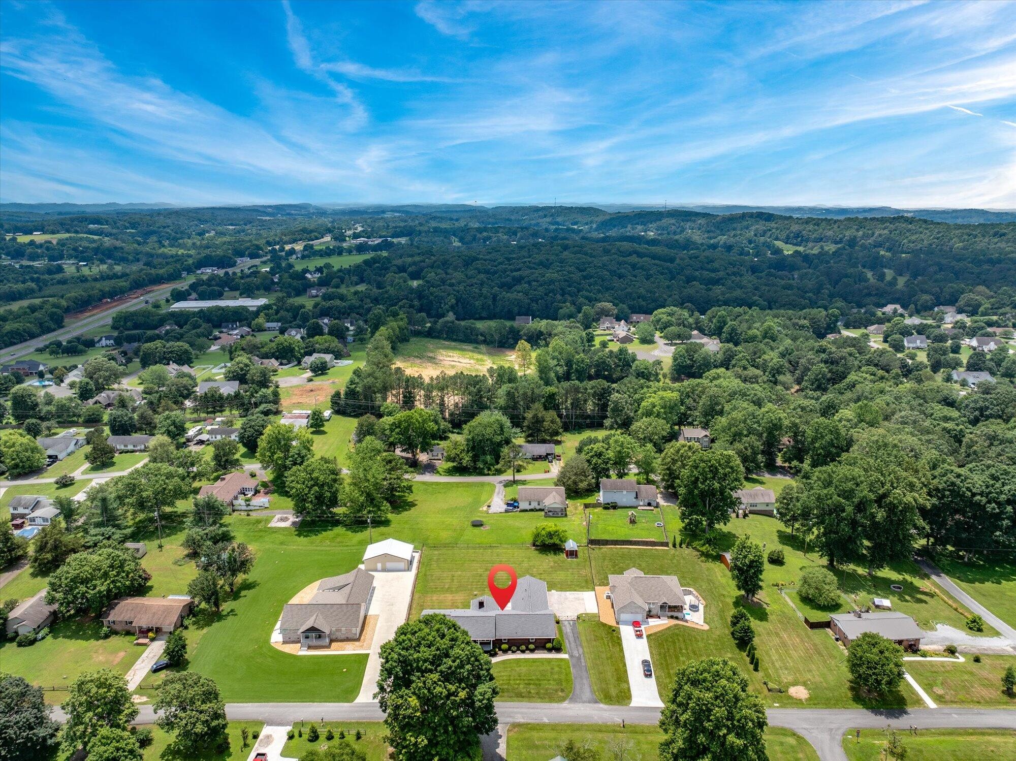 137 County Road 146 Riceville, TN 37370 - Photo 46 of 58 an aerial view of multiple house