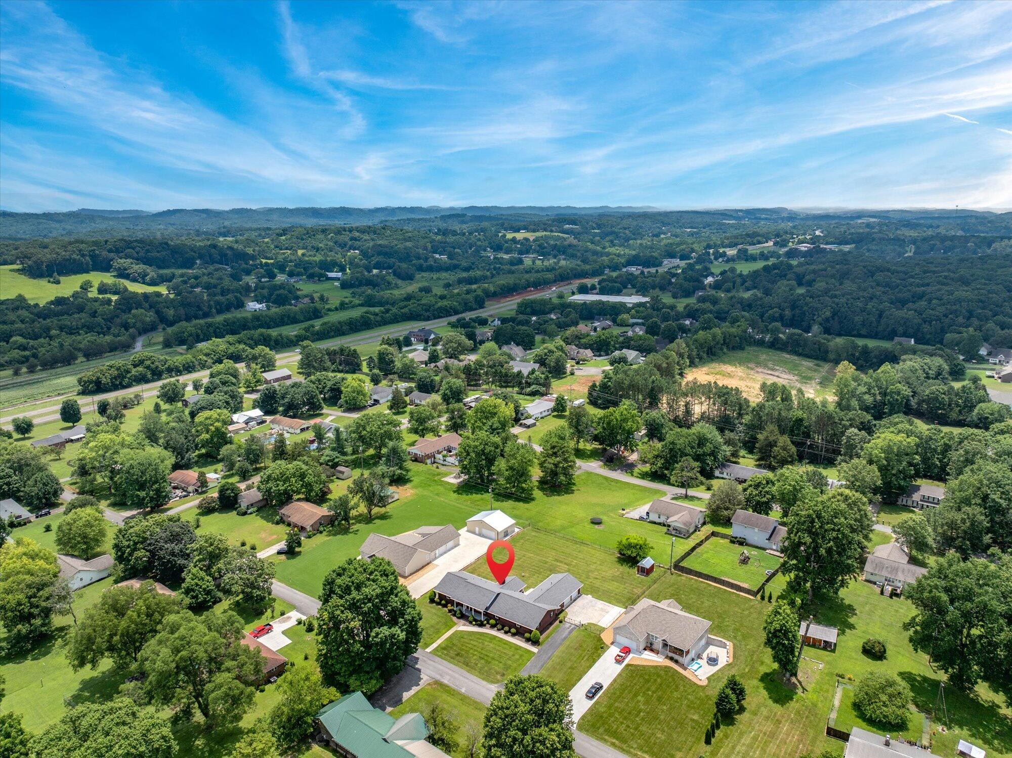 137 County Road 146 Riceville, TN 37370 - Photo 47 of 58 an aerial view of residential houses with outdoor space and trees