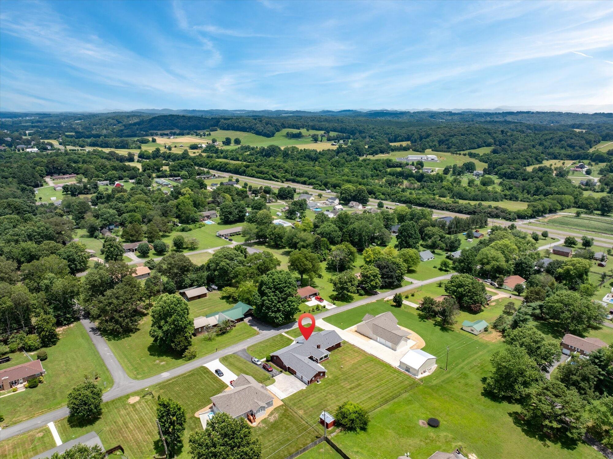 137 County Road 146 Riceville, TN 37370 - Photo 49 of 58 an aerial view of residential houses with outdoor space and street view
