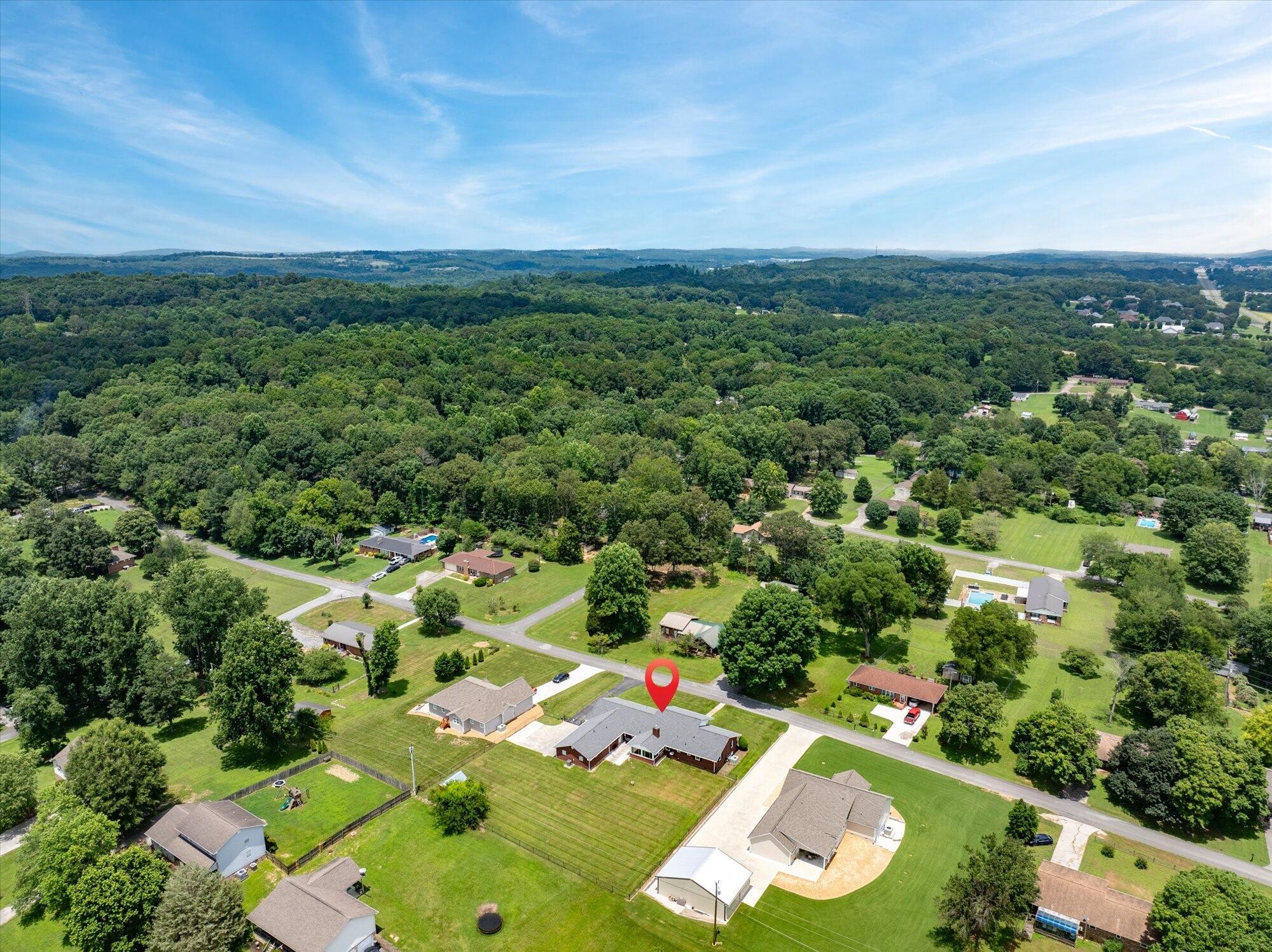 137 County Road 146 Riceville, TN 37370 - Photo 51 of 58 an aerial view of residential houses with outdoor space and trees