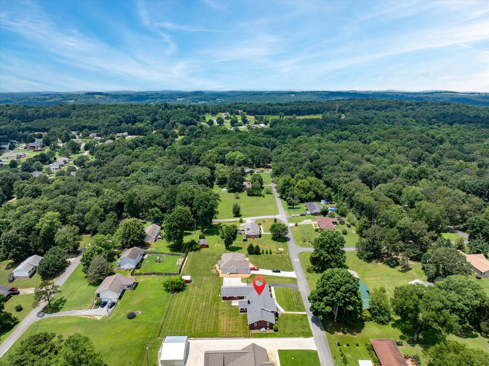 137 County Road 146 Riceville, TN 37370 - Photo 52 of 58 an aerial view of multiple house