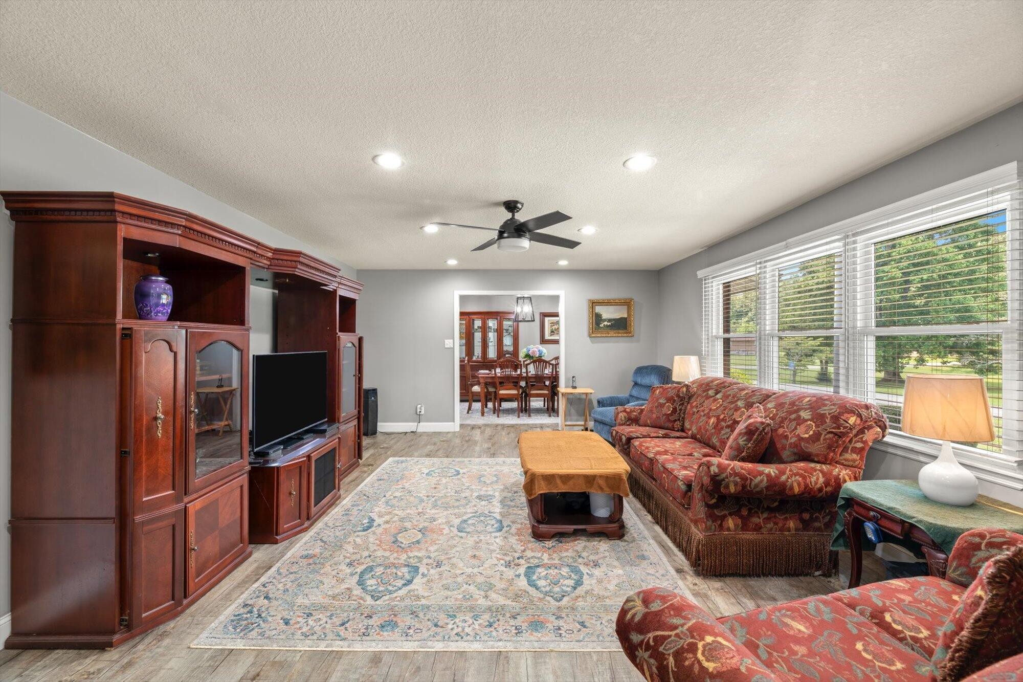 137 County Road 146 Riceville, TN 37370 - Photo 7 of 58 a living room with furniture flat screen tv and large window