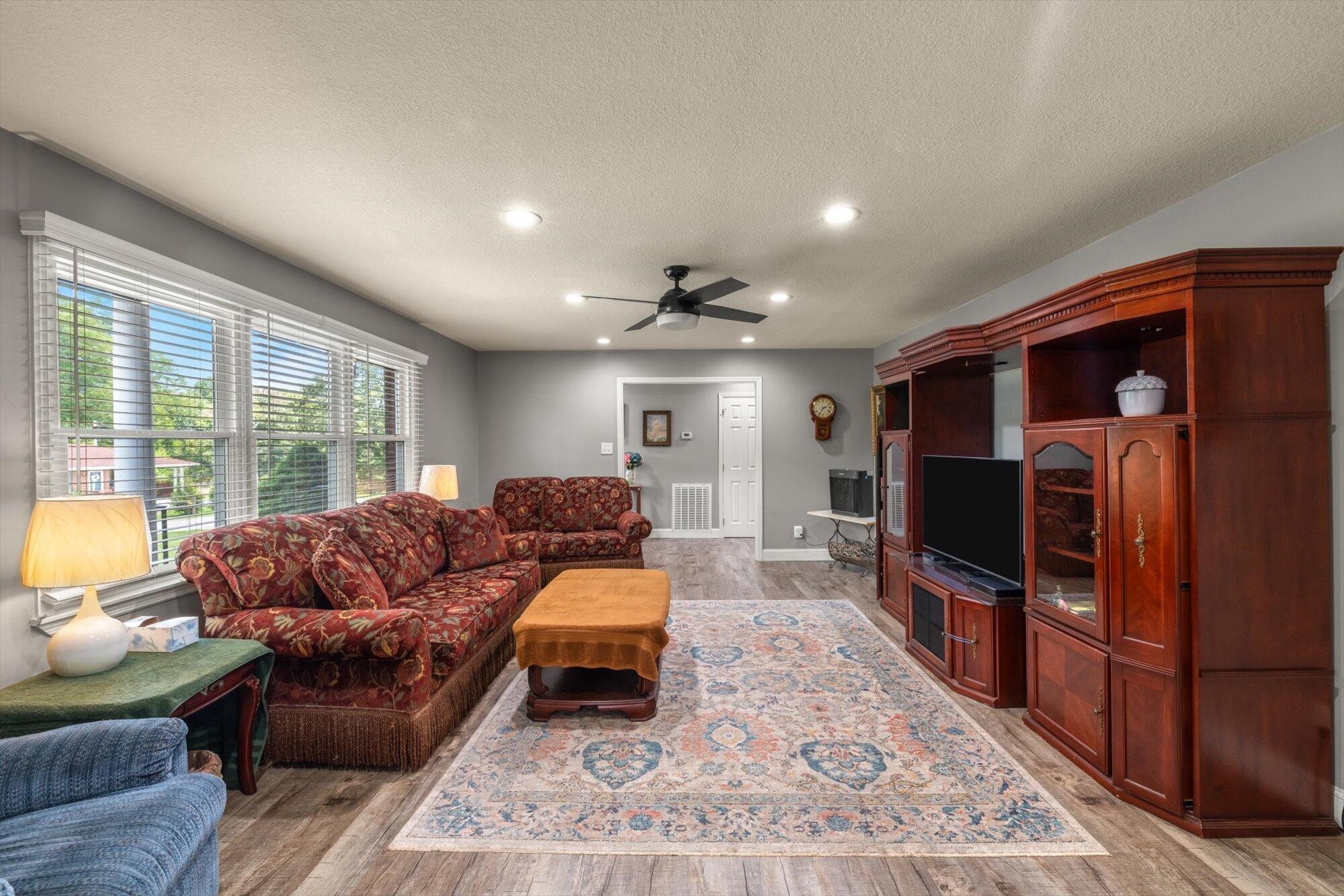 137 County Road 146 Riceville, TN 37370 - Photo 8 of 58 a living room with furniture and a flat screen tv