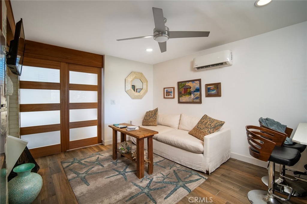 33915 Robles Drive, Unit B Dana Point, CA 92629 - Photo 5 of 22 a living room with furniture and a window