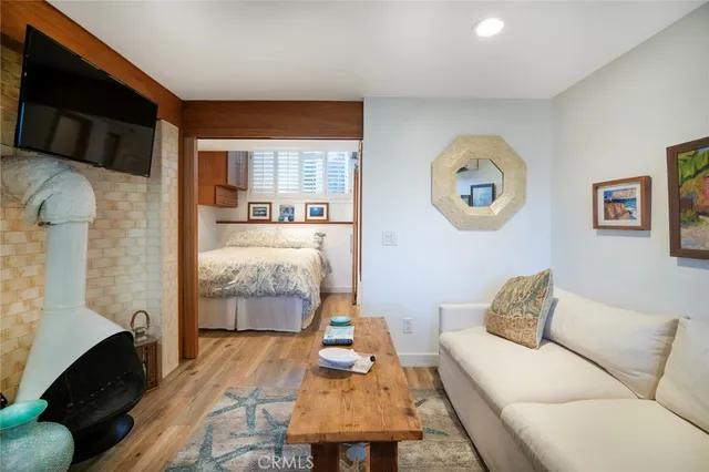 a bedroom with a bed and a couch