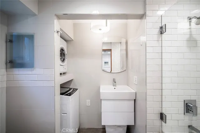a bathroom with a sink and mirror