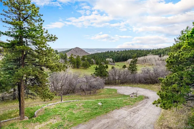 a view of lake with green space