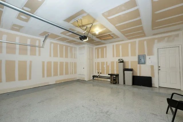 a view of an empty room with furniture