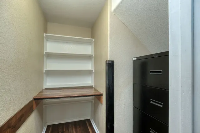 a storage room with washer and dryer