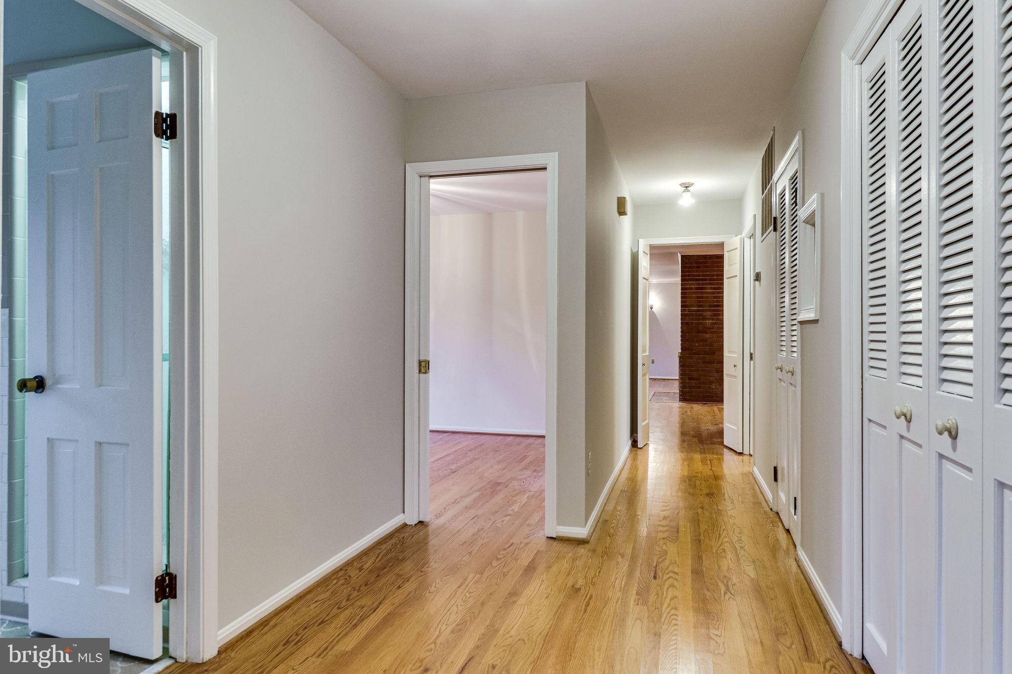 2030 Hunter Mill Road Vienna, VA 22181 - Photo 51 of 88 Hall to living room, laundry closet