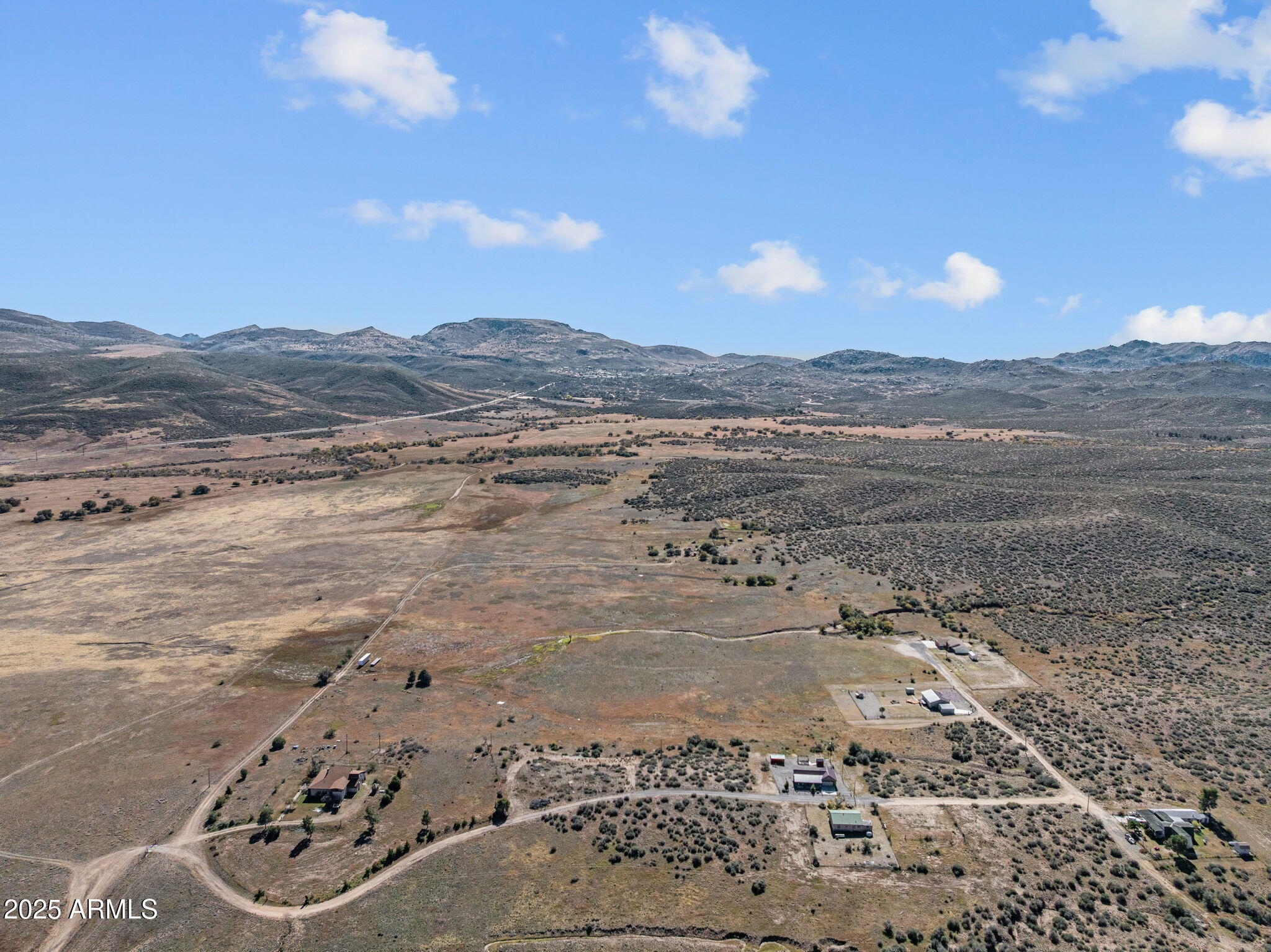 16057 Sickles Ranch Road Peeples Valley, AZ 86332 - Photo 30 of 39 a view of a lake with a mountain