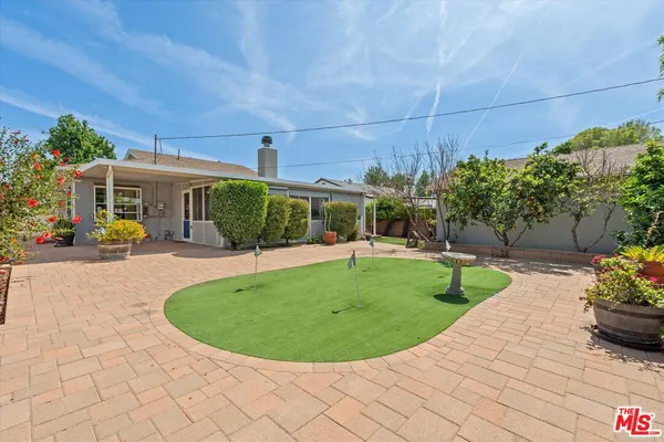 a view of a house with a swimming pool