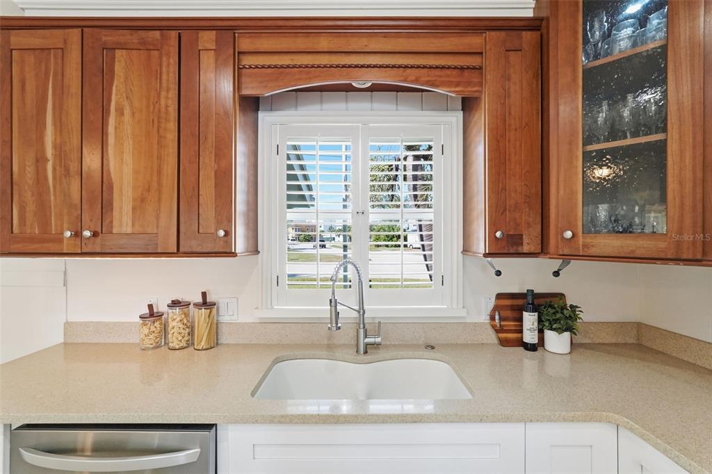 15302 Harbor Drive Madeira Beach, FL 33708 - Photo 18 of 47 a kitchen with a sink and a window